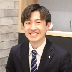 谷 直明